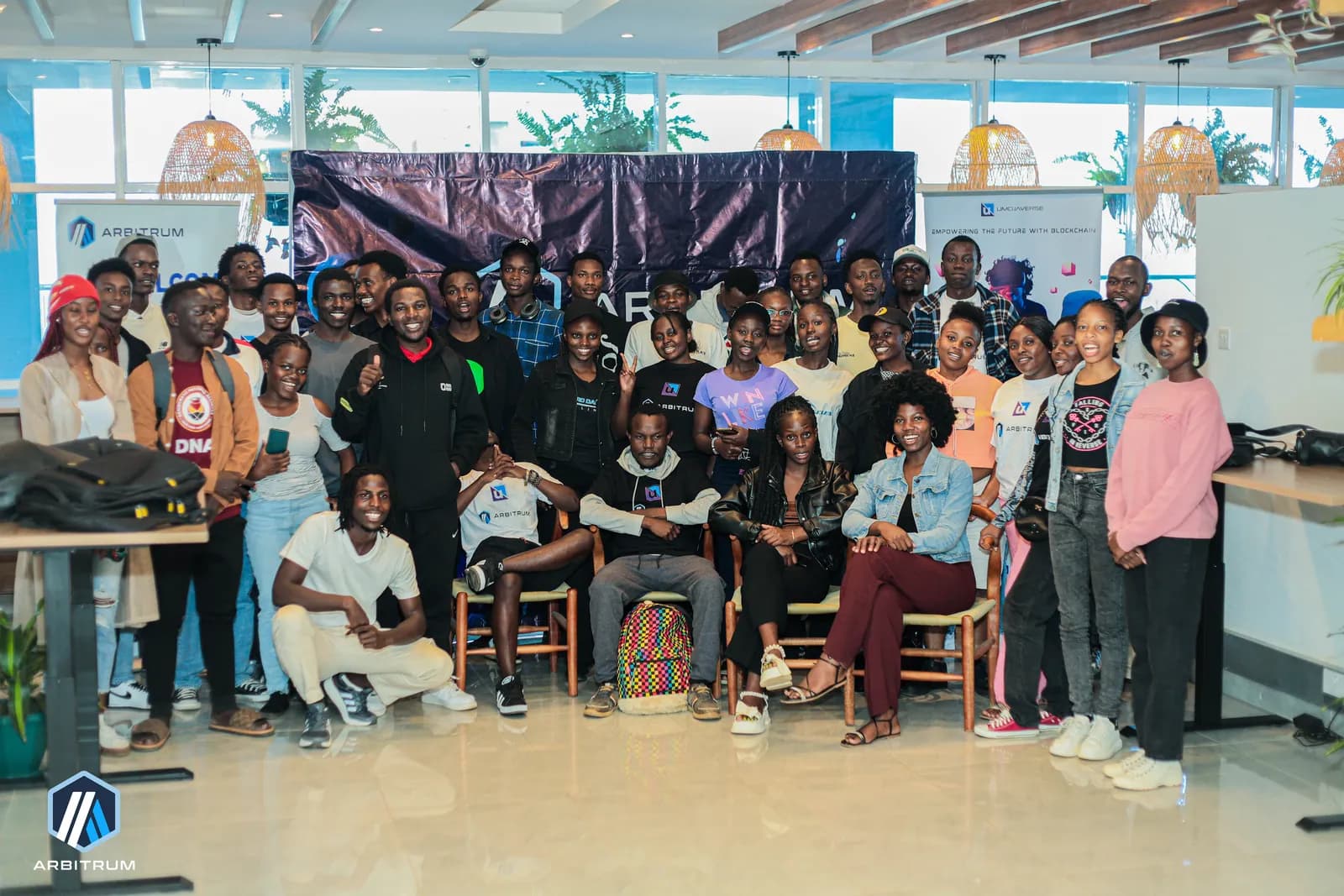 Community members smiling and celebrating together after a session